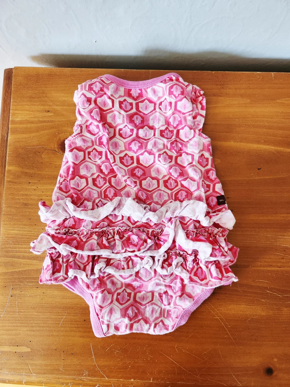 Tea Collection 6-12m Pink Ruffle Sleeveless Onesie with Geometric Print